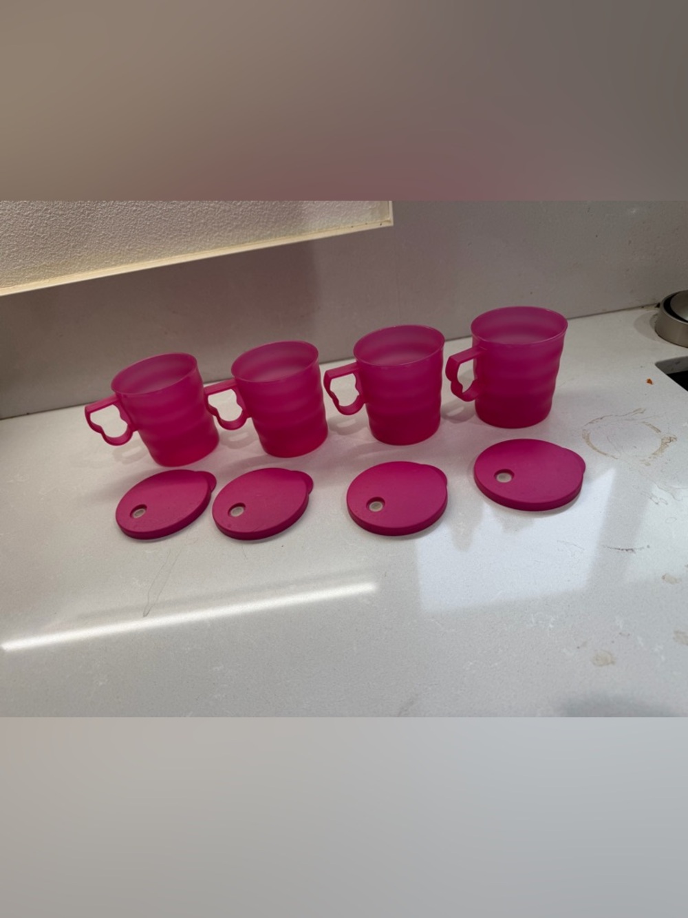 Tupperware Hot Pink Collapsible Silicone Mugs with Lids - Set of 4